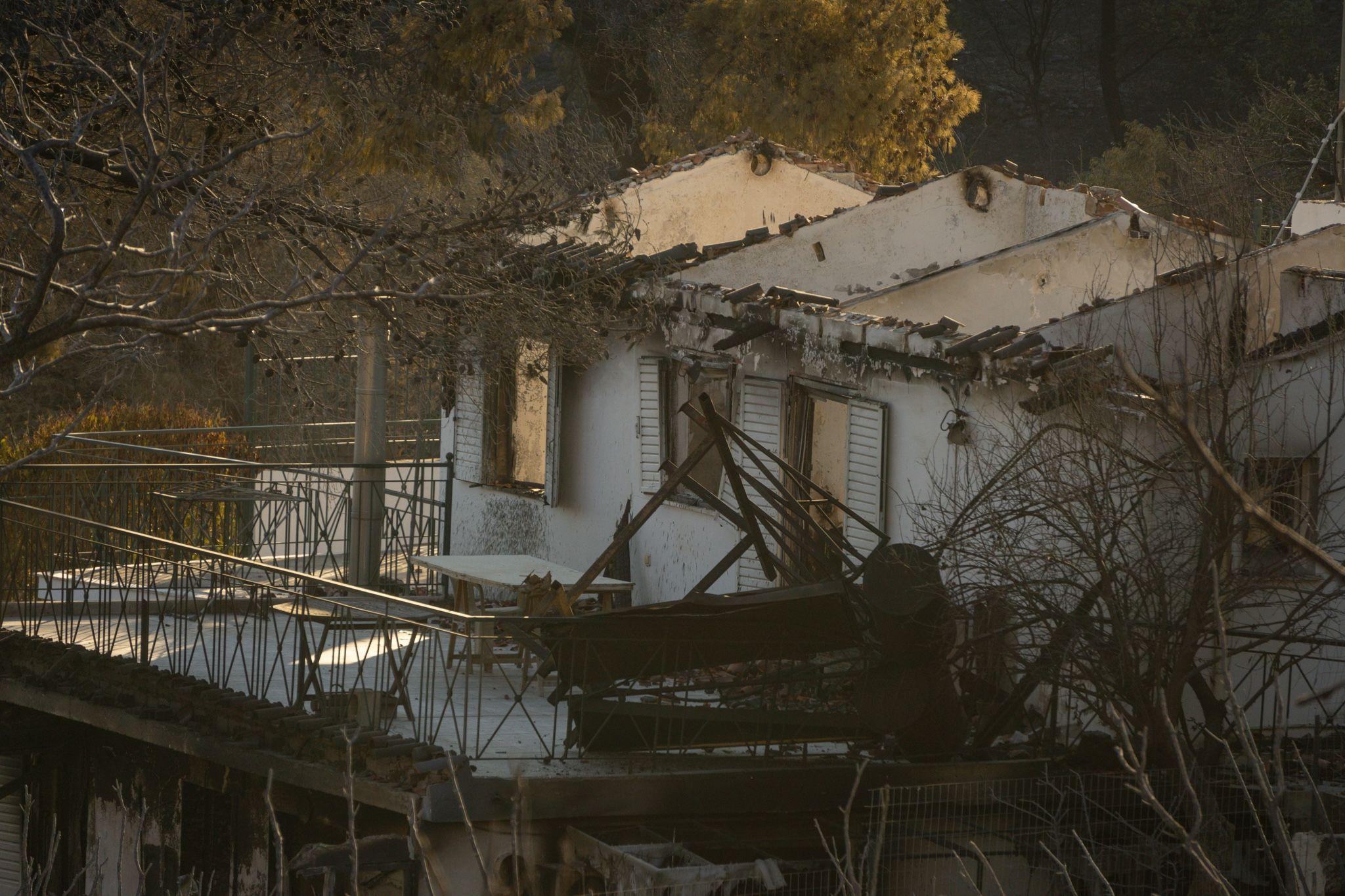 Other houses, across the street, have been destroyed completely. Photo: Ioana Epure