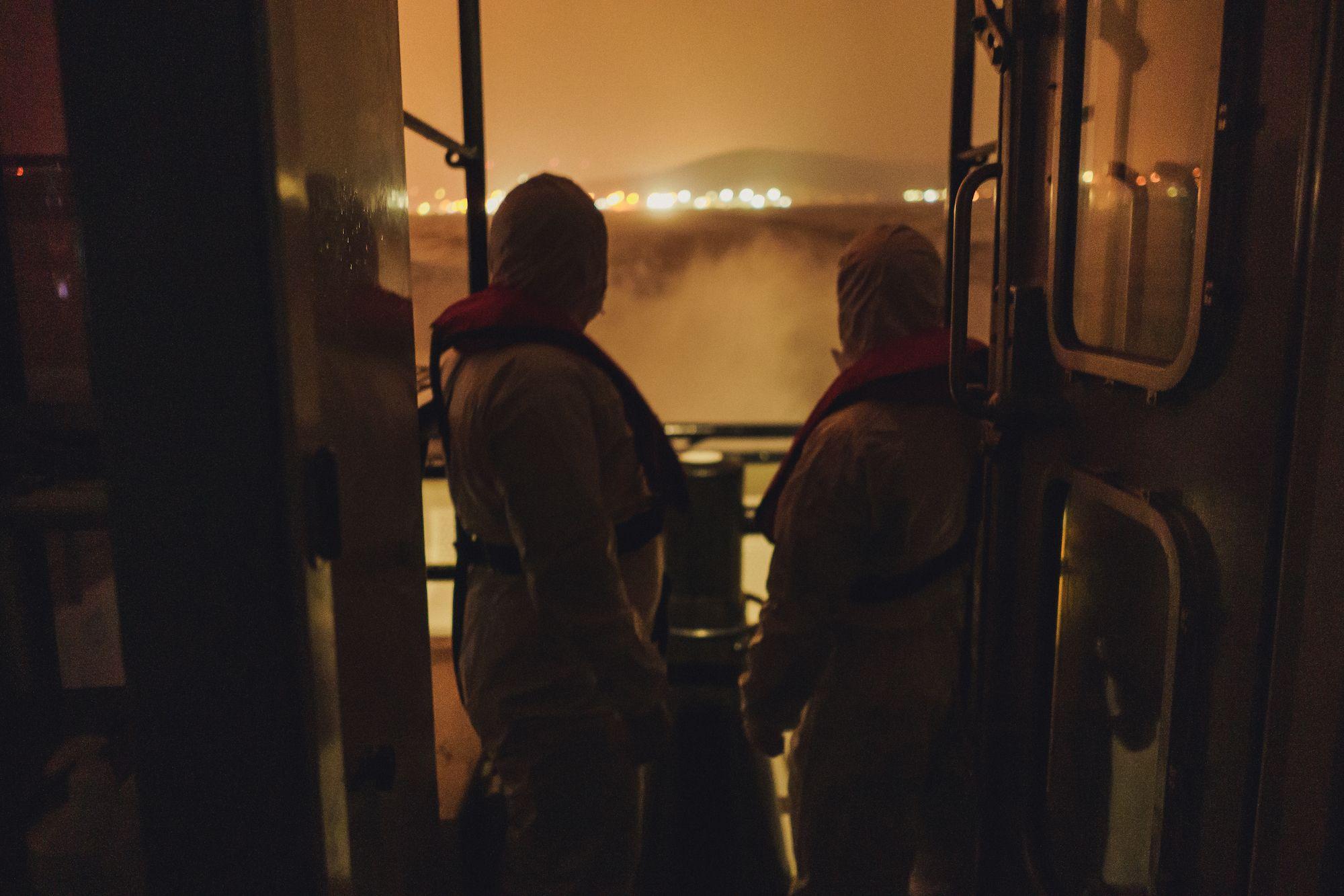 The Turkish Coast Guard rescue team wears protective suits and masks. Photo: Ioana Epure