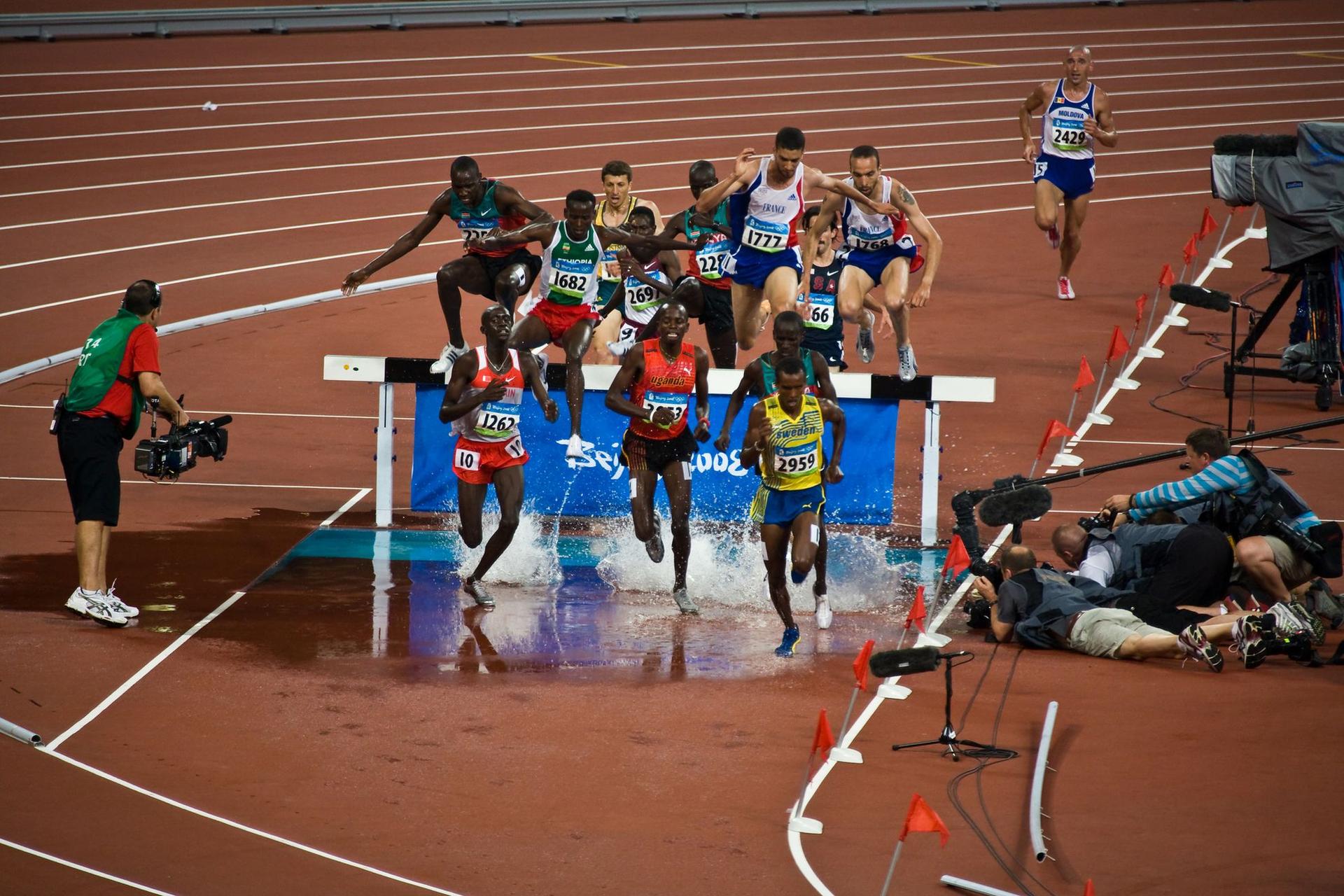 Proba de 3000 de metri obstacole la Jocurile Olimpice din Beijing 2008 © Pniesen | Dreamstime.com