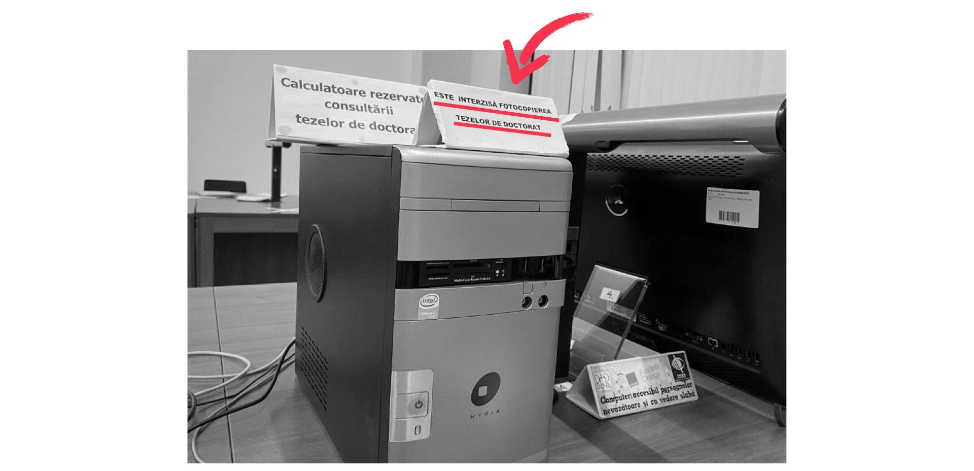 Computers reserved for consulting PhD theses at the National Library. The sign reads: “Photographing the PhD theses is prohibited”.