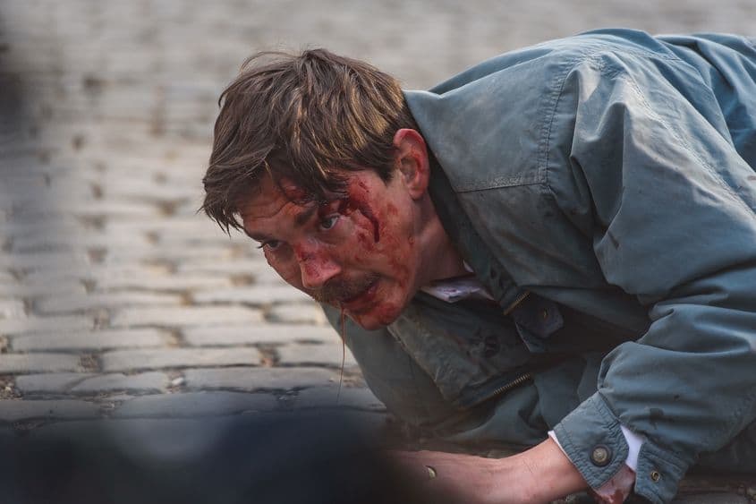 Actorul Alex Calangiu în rolul milițianului Viorel. Captură video din filmul „Libertate”