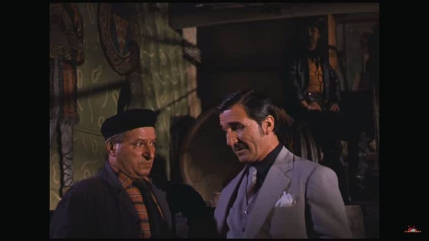 Filmele epocii arătau o lume în care „organele” erau omnisciente și omniprezente, iar ticăloșii care stricau paradisul comunist erau prinși comic de rapid. (Foto: Secretul lui Bachus, 1984)