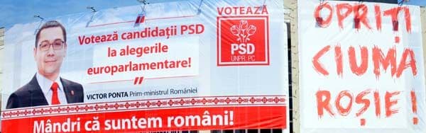 Afișul postat în 2014 pe fațada Casei de Cultură a Tineretului din Slatina.