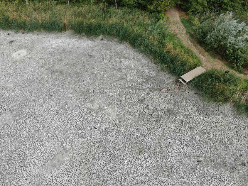Imagine aeriană cu delta Neajlovului secată de apă în urma unei îndelungate perioade de secetă, în Comana, județul Giurgiu, 28 august 2024. Inquam Photos / George Călin
