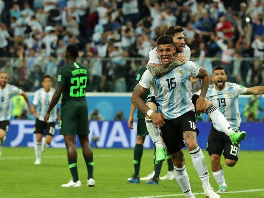 Rojo și Messi, autorii golurilor Argentinei cu Nigeria. Sursa foto: Fifa.com